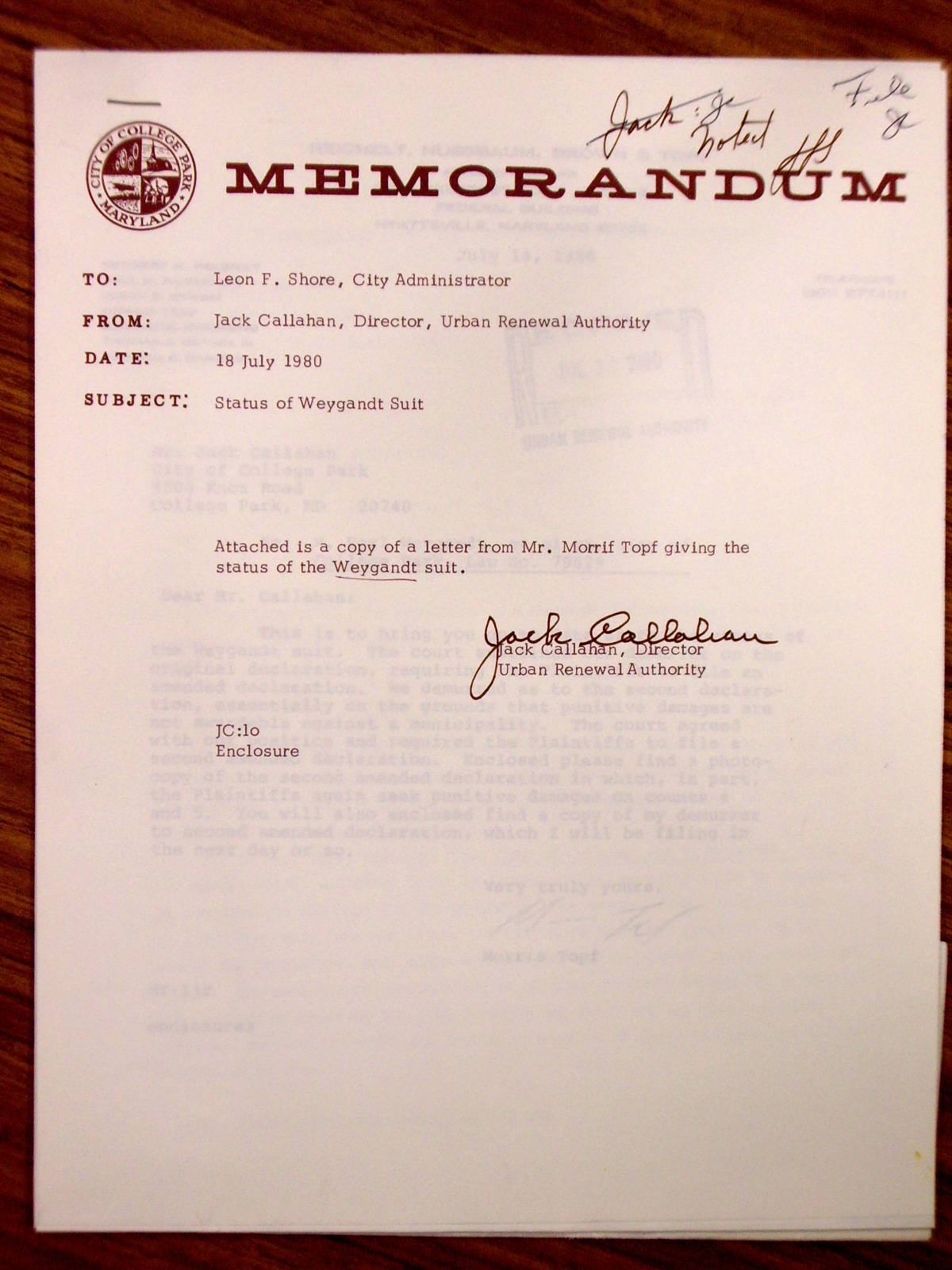 Memorandum from Jack Callahan to Leon Shore, enclosing a letter from Mr. Morris Topf giving the status of the Weygandt suit