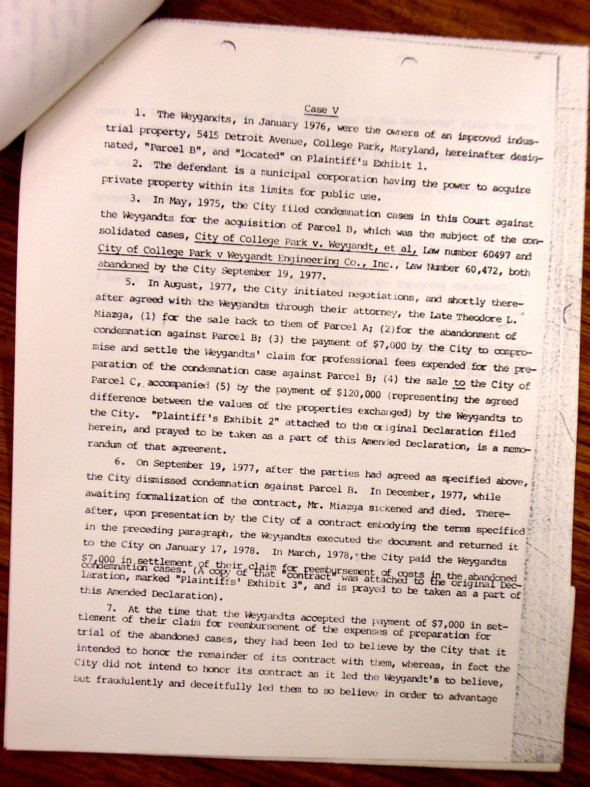 Memorandum from Jack Callahan to Leon Shore, enclosing a letter from Mr. Morris Topf giving the status of the Weygandt suit