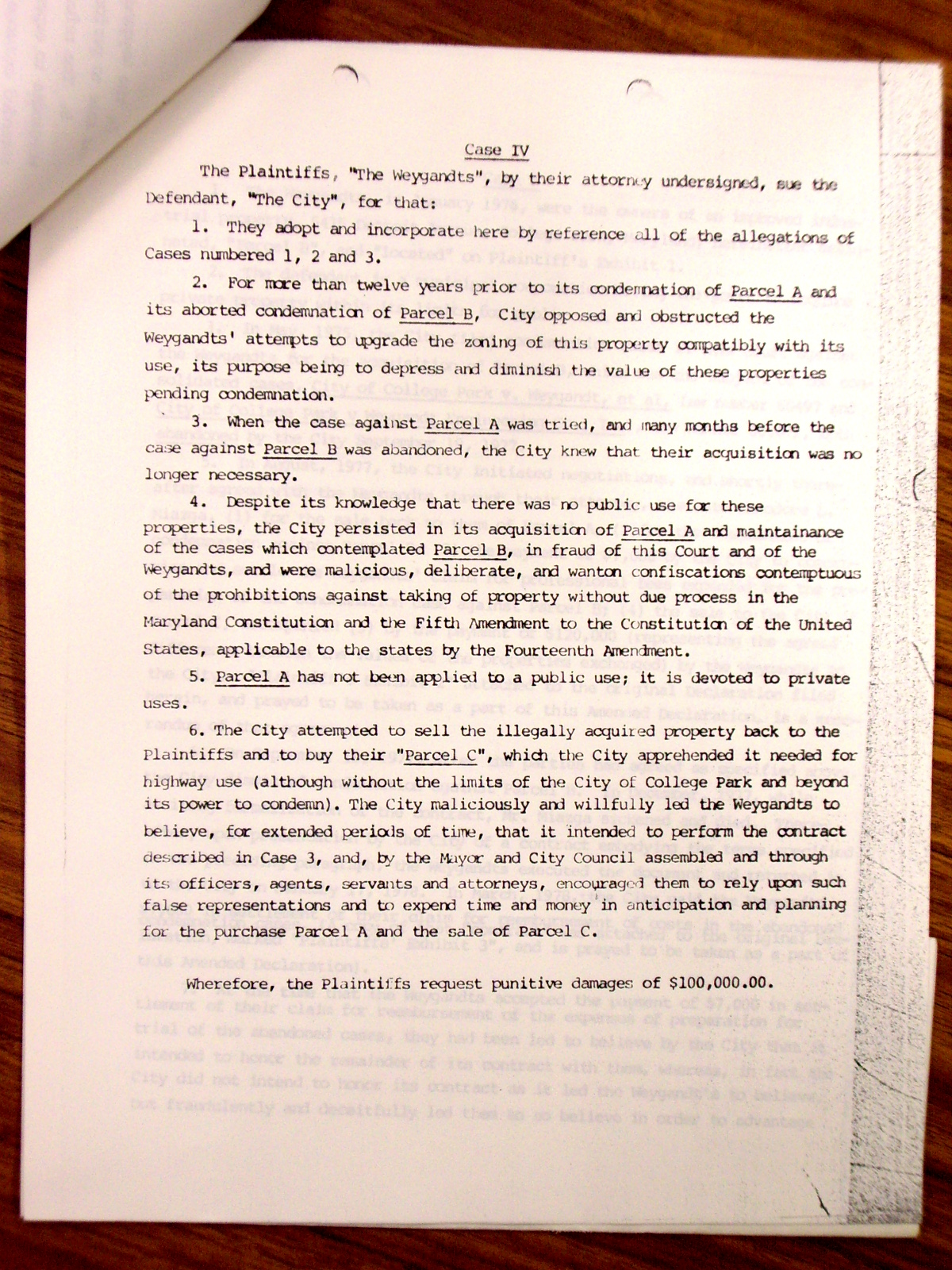 Memorandum from Jack Callahan to Leon Shore, enclosing a letter from Mr. Morris Topf giving the status of the Weygandt suit