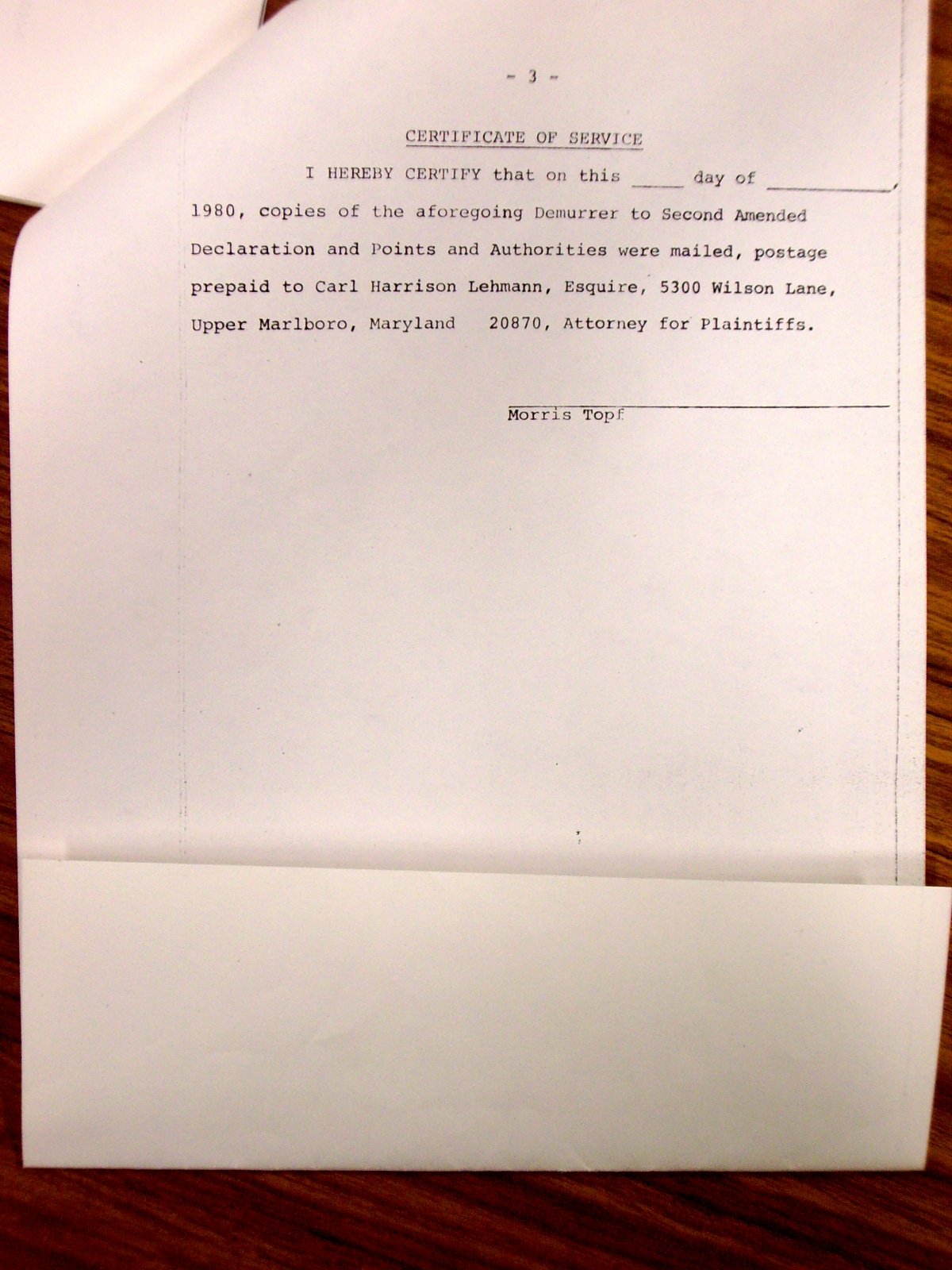 Memorandum from Jack Callahan to Leon Shore, enclosing a letter from Mr. Morris Topf giving the status of the Weygandt suit